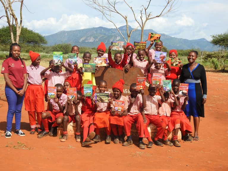 Community children participating in the Plastic for Books Project